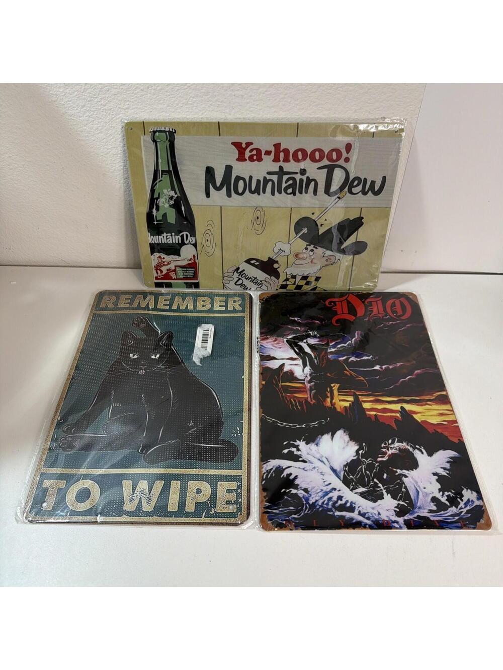 Retro Metal Signs: Mountain Dew, Dio, Cat (New & Sealed, Minor Dents)
